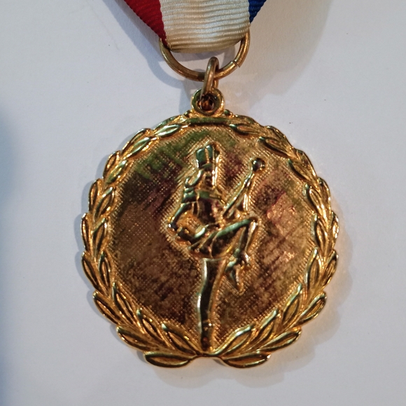 VTG Baton Twirling Majorette Golden Medal Embossed Image Laurel Wreath Dated - Picture 1 of 5